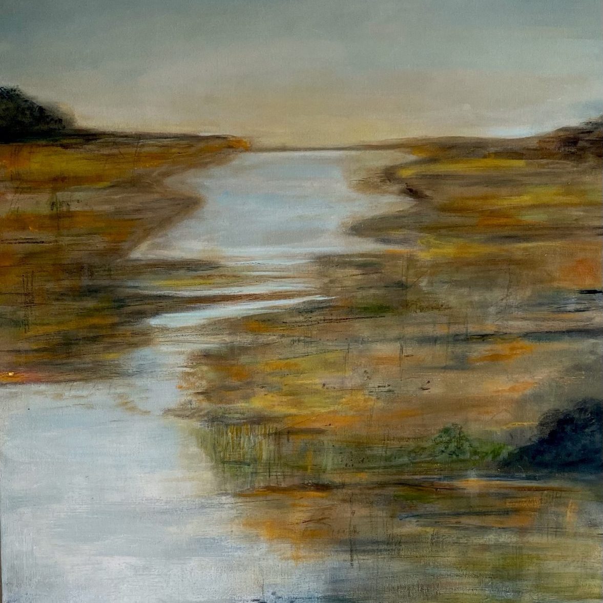 A meandering river going through the landscape slowly